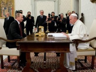Putin sits with Vatican Leader